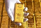 Vàng suy yếu, bạc phục hồi giữa lo ngại Fed duy trì lãi suất cao