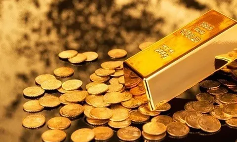 Giá vàng thế giới tăng, trong nước giảm