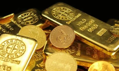 Giá vàng thế giới và trong nước tiếp tục giảm